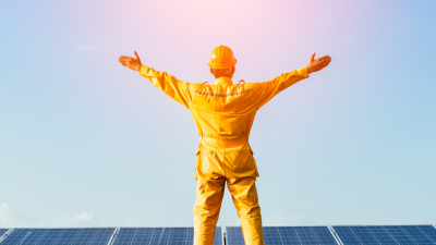 Man standing on solar panels